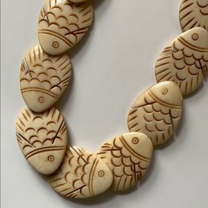 Vintage carved bone necklace with fish